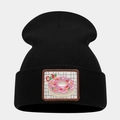 Detail of black knit beanie featuring a donut dessert embroidery patch with Cake text - Style 3-Pink Donut