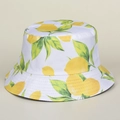 Reversible white cotton sun hat with vibrant lemon and green leaf pattern print - M (56-58cm) / White Lemon