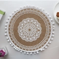Handwoven round jute placemat featuring white mandala lace and pom-pom fringe - Type O White Pom-poms