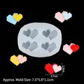 Translucent heart silicone mold with multi-color resin heart pieces on black background - Style 1