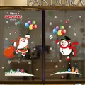 Detailed Christmas window decals featuring Santa, snowman, and snowflakes on glass - HYC-61 Christmas Balloon Park