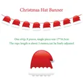 Christmas paper banner featuring eight red Santa hats with a three-meter adjustable string - Christmas Hat Banner