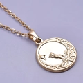 Close-up of 18k gold plated cat relief pendant with moon and star details on chain - Gold Color (Necklace Set)