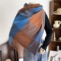 Plaid cashmere-like scarf with blue and brown tassels displayed on a mannequin - Blue Camel Plaid