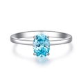 Elegante anello con gemma ovale blu cielo da 1 carato e montatura a quattro griffe S925 - US 5 / Zirconia Blu (CBJZ156)