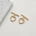 Macro shot of 14K gold-plated heart-shaped OT toggle clasp with beaded texture for DIY - Style A Heart Beaded / 14K Gold