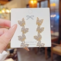 Elegant 925 silver needle drop earrings with four crystal butterflies in gold finish - Quad Butterfly Tassel (E0158)