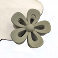 Matte olive green flower hair claw clip with floral design on a wooden display board - 7cm Hollow Flower Claw / Khaki