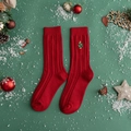 Red knit mid-calf Christmas socks with a small embroidered tree on green background - One Size / Red/Christmas Tree