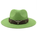 Detail of green straw cowboy hat featuring brown faux leather band and silver bull skull - Fruit Green