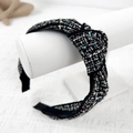 Black tweed knotted headband with colorful speckles on white cylinder stand - Black 16.3CM