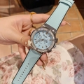 Elegante Quarzuhr für Damen mit hellblauem Silikonarmband und diamantbesetzter Lünette - Blau