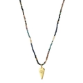 Macro view of bohemian beaded necklace with gold Evil Eye charm and colorful tourmaline - Turquoise/Dark Blue/Brown/Pink