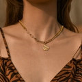 Golden heart pendant necklace with irregular wrinkled texture and asymmetric mixed chains - 18K Gold