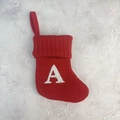 Classic red knitted Christmas stocking with white letter A embroidery for tree decoration - Letter A