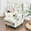 Elastic wingback chair cover featuring colorful birds and green leaves on white fabric - Lucky Birds & Flowers