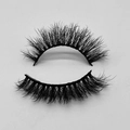 Detailed view of thick cross-texture faux mink eyelashes with black bands on white background - D54