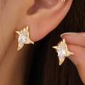 Goldene Sternohrstecker mit Zirkonia im Marquis-Schliff und polierter Metallic-Optik - Goldene Sternenschliff-Ohrstecker mit Marquise-Zirkonia