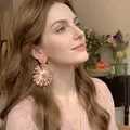 Close-up of pink oversized flower petal earrings with intricate fiber texture and gold bead - Gold-Deep Pink (6# Silver Pin)