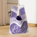 Cute knitted wrist bag in purple and beige featuring a heart Love pattern - Purple-Hearts
