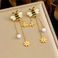Elegant gold bee tassel earrings with flowers and pearls on professional display - Bee Tassel Earrings (E6248)