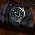 Men's business quartz watch set with three stylish bracelets on dark wood display - Blue Set