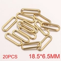 Dettaglio di connettori ovali dorati per orecchini fai da te set da 20 pezzi 18.5x6.5mm - Stile A / Oro