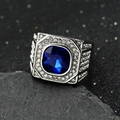 Macro detail of men's silver steel signet ring with blue gemstone and pavé diamonds - Steel Blue Stone