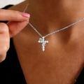 Silver cross necklace for women featuring sparkling stones and intricate floral textures - White K 6205 (Alloy)