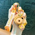 Cute cartoon capybara keychain with a camera-shaped silicone pendant in bright orange - Projection Camera - Orange