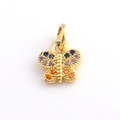 Detailed view of a gold butterfly charm with colorful zircon stones for DIY jewelry making - Pavé Multicolored Gemstone Gold Butterfly Style (04)