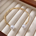 Golden twisted rope cuff bracelet featuring elegant white pearls on a velvet jewelry box - 62# Twisted Rope Pattern Double Pearl Open Style / Gold