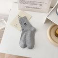 Grey cable-knit mid-calf socks featuring a black heart and rabbit ear embroidery detail - One Size / Gray