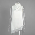 Detail view of the elegant satin fabric texture and irregular white lace hem on the top - S / White