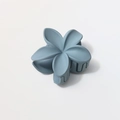 Macro view of matte grey-blue frangipani hair claw clip with 8cm frosted petals - Matte Light Blue
