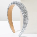 Macro shot of silver padded headband featuring luxury rhinestones and non-slip lining - Silver