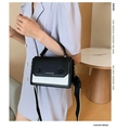 Women's 2024 chic black and white contrast leather shoulder bag with gold hardware - Black