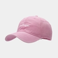 Detail shot of pink cotton baseball cap with white cursive Dragon embroidery on front - Adjustable / Pink