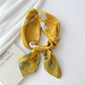 Ginger yellow silk scarf with white floral print and satin finish in a stylish knot - Lily of the Valley Shadow Yellow