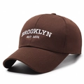 Dark brown cotton baseball cap with white Brooklyn embroidery and a curved brim design - Coffee