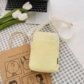 Yellow vertical canvas phone crossbody bag with adjustable strap and front pocket - Yellow