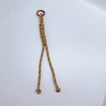 Handmade paracord charm in khaki and black weave with a sturdy reddish-brown metal ring - Brown