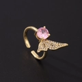 Elegant adjustable gold bow ring with pink zircon stone and sparkling crystal wings - Dynamic Wing Style