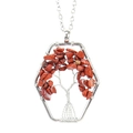 Macro shot of handmade silver wire-wrapped Tree of Life pendant with red jasper stones - Red Jasper