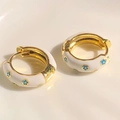 Classic gold hoop earrings with white enamel coating and delicate blue floral patterns - White