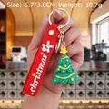 Christmas tree PVC keychain with a red silicone wrist strap and metal ring clasp - Christmas Tree-1