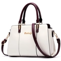 Minimalist white PU leather handbag for women with burgundy straps and golden hardware details - White
