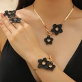 Elegant jewelry set featuring black flower pendants on gold chains for women - Black Flower Set (Earrings+Bracelet+Necklace)