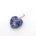 Blue and white natural stone heart pendant with polished finish on white background - Blue Spot Stone