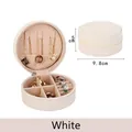 White round PU leather travel jewelry box with zipper and interior compartments - White